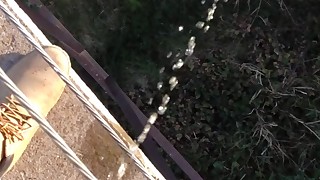 Pissing Off a Railroad Bridge