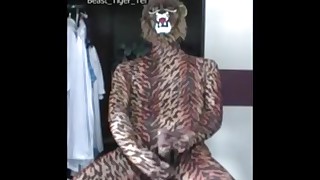 Lion costumed man masturbates